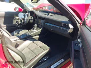 2016 Porsche 911 4S z VIN WP0BB2A99GS136573, wystawiony jako IAAI lot #42238845 z przebiegiem 13 464 mil mil oraz . Historia ofert i sprzedaży dostępna na DreamBid. Obrazek 5.