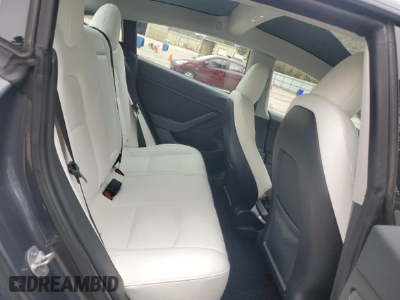 2023 Tesla Model 3 z VIN 5YJ3E1EA0PF620784, wystawiony jako Copart lot #49323115 z przebiegiem 69 263 mil mil oraz Szkoda całkowita • Salvage title. Historia ofert i sprzedaży dostępna na DreamBid. Obrazek 11.