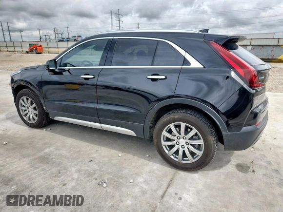 2020 Cadillac XT4 FWD Premium Luxury with VIN 1GYFZCR40LF073517, listed as a Copart auction lot 60121635 with 79,450 mi miles and Salvage title. Bid and sale history available at DreamBid. Image 2.