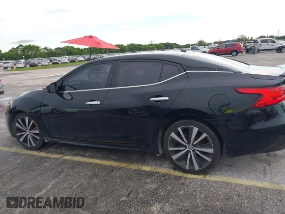 2016 Nissan Maxima SR with VIN 1N4AA6AP9GC428938, listed as a IAAI auction lot 42419663 with 121,501 mi miles and . Bid and sale history available at DreamBid. Image 14.