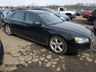 2015 Audi A8 L 4.0T with VIN WAU32AFD7FN033464, listed as a Copart auction lot 42682643 with 130,105 mi miles. Bid and sale history available at carsss.com. Image 4.