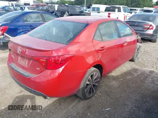 2017 Toyota Corolla L with VIN 2T1BURHE6HC831795, listed as a IAAI auction lot 42561179 with 94,236 mi miles and . Bid and sale history available at DreamBid. Image 4.