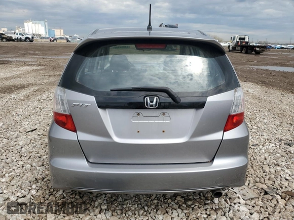 2009 Honda Fit Sport with VIN JHMGE884X9S045405, listed as a Copart auction lot 54094395 with 149,701 mi miles and Clean Title. Bid and sale history available at carsss.com. Image 6.