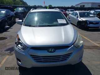 2013 Hyundai Tucson GLS with VIN KM8JU3AC3DU551018, listed as a IAAI auction lot 41988305 with 214,728 mi miles. Bid and sale history available at carsss.com. Image 12.