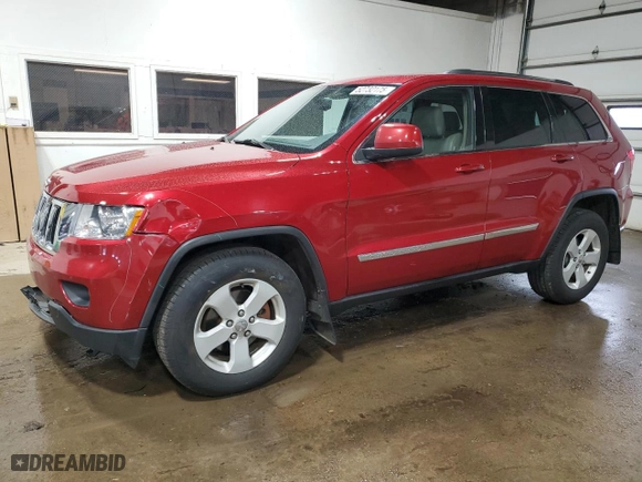 2011 Jeep Grand Cherokee Laredo with VIN 1J4RR4GG1BC511204, listed as a Copart auction lot 52732175 with 122,311 mi miles and Salvage Title. Bid and sale history available at carsss.com. Image 1.