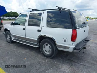 1995 Chevrolet Tahoe with VIN 1GNEC13K9SJ414611, listed as a IAAI auction lot 42798752 with 205,988 mi miles and . Bid and sale history available at DreamBid. Image 3.