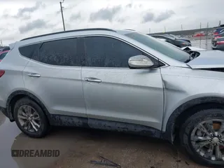 2017 Hyundai Santa Fe Sport 2.0T with VIN 5XYZU4LA4HG437089, listed as a IAAI auction lot 41457614 with 150,277 mi miles. Bid and sale history available at carsss.com. Image 14.