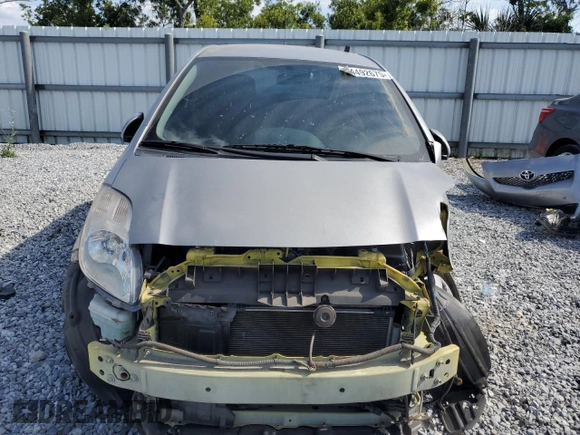 2010 Toyota Yaris with VIN JTDJT4K33A5298431, listed as a Copart auction lot 54492675 with 91,758 mi miles and Salvage Title. Bid and sale history available at carsss.com. Image 5.