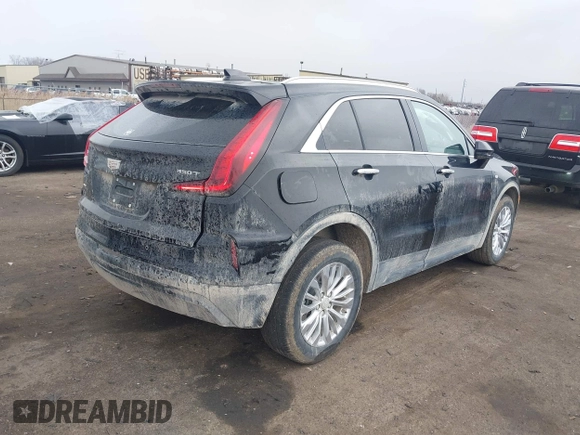 2024 Cadillac XT4 AWD Luxury with VIN 1GYFZBR41RF101697, listed as a IAAI auction lot 41971217 with 16,027 mi miles and . Bid and sale history available at carsss.com. Image 4.