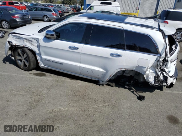 2015 Jeep Grand Cherokee High Altitude с VIN 1C4RJFCM2FC215232, выставлен на аукционе Copart как лот 60002875 с пробегом 122 813 миль миль и Списание • Salvage title. История ставок и продаж доступна на DreamBid. Изображение 2.