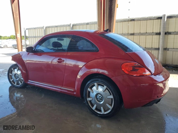 2012 Volkswagen Beetle 2.5L with VIN 3VWJX7AT7CM662822, listed as a Copart auction lot 74215804 with 115,890 mi miles and Salvage Title. Bid and sale history available at carsss.com. Image 2.
