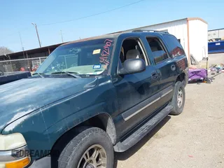 2004 Chevrolet Tahoe LS z VIN 1GNEC13V74J307523, wystawiony jako IAAI lot #41820407 z przebiegiem 237 728 mil mil oraz . Historia ofert i sprzedaży dostępna na DreamBid. Obrazek 6.