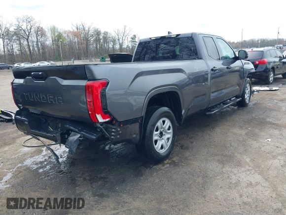 2023 Toyota Tundra with VIN 5TFKB5GDXPX002218, listed as a IAAI auction lot 41932719 with 71,335 mi miles and . Bid and sale history available at DreamBid. Image 4.