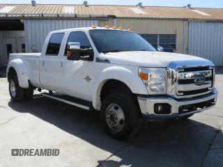 2012 Ford F-450 XL with VIN 1FT8W4DTXCEB96713, listed as a Copart auction lot 71784504 with 220,911 mi miles and Salvage Title. Bid and sale history available at carsss.com. Image 1.