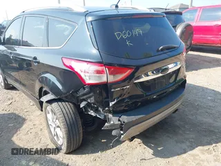 2014 Ford Escape Titanium with VIN 1FMCU9J93EUD60149, listed as a IAAI auction lot 39837388 with 154,880 mi miles. Bid and sale history available at carsss.com. Image 6.
