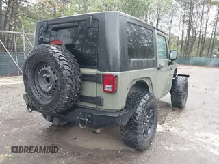 2007 Jeep Wrangler X with VIN 1J4FA24127L231409, listed as a IAAI auction lot 41971429 with 181,855 mi miles and . Bid and sale history available at carsss.com. Image 4.