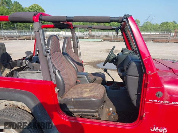 2000 Jeep Wrangler SE with VIN 1J4FA29P6YP775127, listed as a IAAI auction lot 42377387 with Not provided miles and . Bid and sale history available at DreamBid. Image 5.