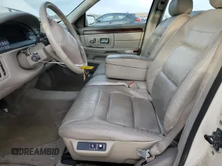 1999 Cadillac DeVille z VIN 1G6KD54Y8XU790082, wystawiony jako Copart lot #87709165 z przebiegiem 112 485 mil mil oraz Czysty tytuł • Clean title. Historia ofert i sprzedaży dostępna na DreamBid. Obrazek 7.