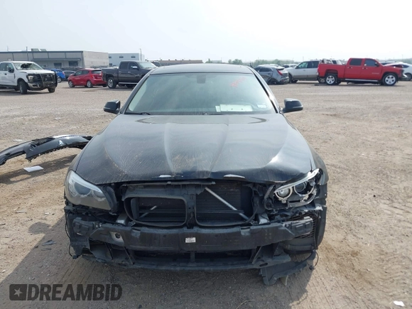 2015 BMW 5 Series 528i with VIN WBA5A5C58FD520694, listed as a IAAI auction lot 41804906 with 121,636 mi miles. Bid and sale history available at carsss.com. Image 13.