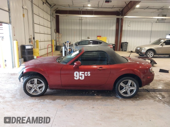 2007 Mazda MX-5 Miata Sport z VIN JM1NC25F970132299, wystawiony jako IAAI lot #41622791 z przebiegiem 72 392 mil mil oraz . Historia ofert i sprzedaży dostępna na DreamBid. Obrazek 15.