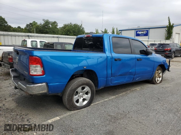 2023 Ram 1500 Tradesman with VIN 1C6SRFGT1PN666130, listed as a Copart auction lot 69990804 with 2,229 mi miles and Salvage title. Bid and sale history available at DreamBid. Image 3.