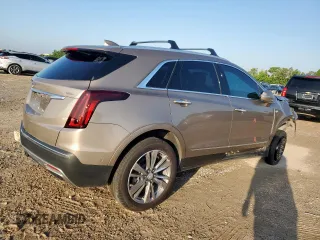 2022 Cadillac XT5 Premium Luxury FWD z VIN 1GYKNERS9NZ120517, wystawiony jako Copart lot #58978045 z przebiegiem 31 456 mil mil oraz Szkoda całkowita • Salvage title. Historia ofert i sprzedaży dostępna na DreamBid. Obrazek 3.