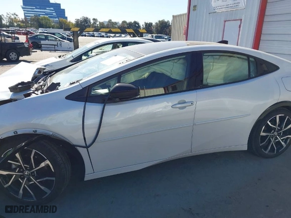 2024 Toyota Prius Prime SE with VIN JTDACACU1R3012458, listed as a IAAI auction lot 41334718 with NaN miles. Bid and sale history available at carsss.com. Image 14.