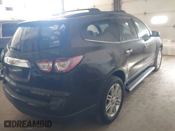 2015 Chevrolet Traverse LT with VIN 1GNKRGKDXFJ371359, listed as a IAAI auction lot 42691574 with Not provided miles and . Bid and sale history available at DreamBid. Image 4.