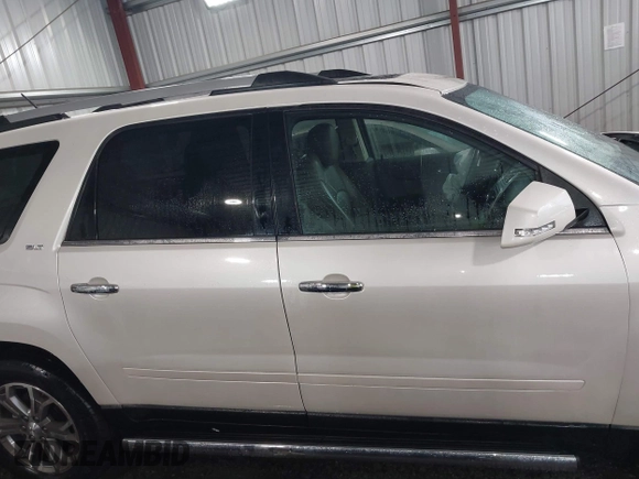 2014 GMC Acadia SLT z VIN 1GKKVSKD4EJ250739, wystawiony jako IAAI lot #42257848 z przebiegiem 78 672 mil mil oraz . Historia ofert i sprzedaży dostępna na DreamBid. Obrazek 13.