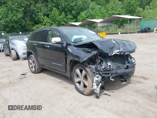 2015 Jeep Grand Cherokee Overland z VIN 1C4RJFCG3FC753772, wystawiony jako IAAI lot #42357411 z przebiegiem 130 970 mil mil oraz . Historia ofert i sprzedaży dostępna na DreamBid. Obrazek 1.