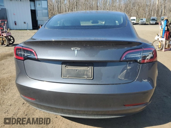 2023 Tesla Model 3 с VIN 5YJ3E1EA9PF569611, выставлен на аукционе Copart как лот 53148505 с пробегом 60 379 миль миль и Списание • Salvage title. История ставок и продаж доступна на DreamBid. Изображение 6.