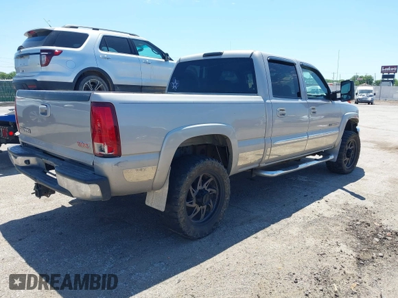 2005 GMC Sierra 2500HD Work Truck with VIN 1GTHC23U95F806475, listed as a IAAI auction lot 42314232 with Not provided miles and . Bid and sale history available at DreamBid. Image 4.