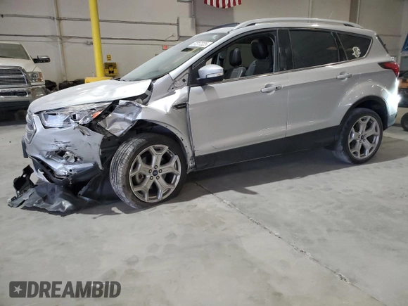 2019 Ford Escape Titanium with VIN 1FMCU0J96KUB77741, listed as a Copart auction lot 57517325 with 90,002 mi miles and Non repairable. Bid and sale history available at DreamBid. Image 1.