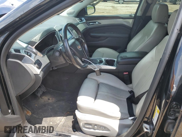 2013 Cadillac SRX Luxury Collection z VIN 3GYFNCE36DS650301, wystawiony jako Copart lot #59977525 z przebiegiem 128 750 mil mil oraz Czysty tytuł • Clean title. Historia ofert i sprzedaży dostępna na DreamBid. Obrazek 7.