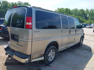 2004 Chevrolet Express Passenger with VIN 1GBFG15T041157045, listed as a IAAI auction lot 42486752 with 319,752 mi miles and . Bid and sale history available at DreamBid. Image 4.