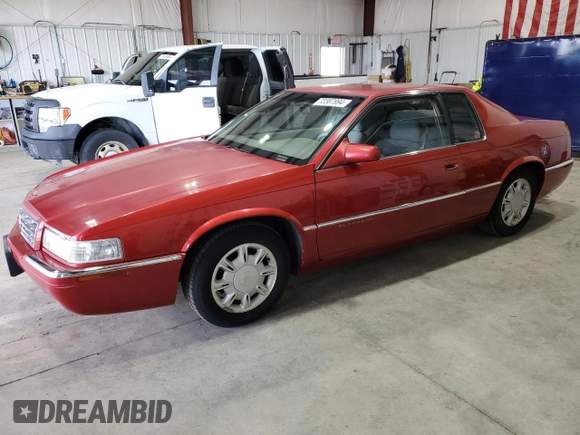 1996 Cadillac Eldorado z VIN 1G6EL12Y3TU620055, wystawiony jako Copart lot #72387994 z przebiegiem 128 641 mil mil oraz Czysty tytuł • Clean title. Historia ofert i sprzedaży dostępna na DreamBid. Obrazek 1.