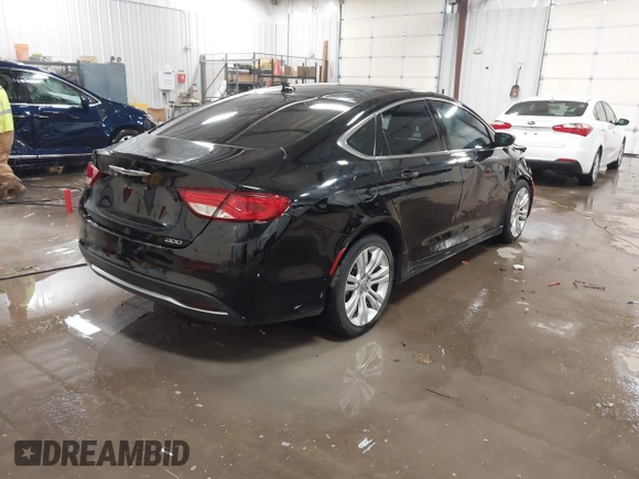 2015 Chrysler 200 Limited with VIN 1C3CCCAB9FN690174, listed as a IAAI auction lot 41330163 with 123,633 mi miles and . Bid and sale history available at carsss.com. Image 4.