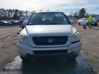 2004 Honda Pilot EX with VIN 2HKYF18634H515163, listed as a IAAI auction lot 40786017 with 206,036 mi miles. Bid and sale history available at carsss.com. Image 12.