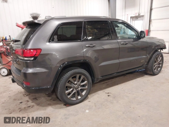 2016 Jeep Grand Cherokee Limited 75th Anniversary with VIN 1C4RJFBG2GC349154, listed as a IAAI auction lot 41392239 with 135,627 mi miles and . Bid and sale history available at DreamBid. Image 4.