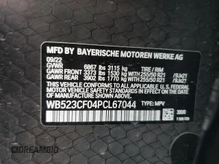 2023 BMW iX xDrive50 with VIN WB523CF04PCL67044, listed as a Copart auction lot 82805014 with 12,858 mi miles and Salvage Title. Bid and sale history available at carsss.com. Image 13.