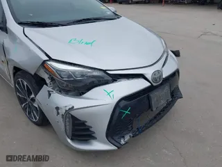 2019 Toyota Corolla L with VIN 5YFBURHEXKP907316, listed as a IAAI auction lot 41378446 with 82,424 mi miles. Bid and sale history available at carsss.com. Image 6.