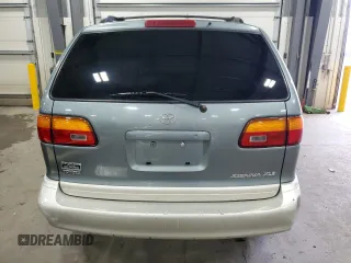 2000 Toyota Sienna LE z VIN 4T3ZF13C7YU284445, wystawiony jako Copart lot #52452465 z przebiegiem 150 609 mil mil oraz Szkoda całkowita • Salvage title. Historia ofert i sprzedaży dostępna na DreamBid. Obrazek 6.