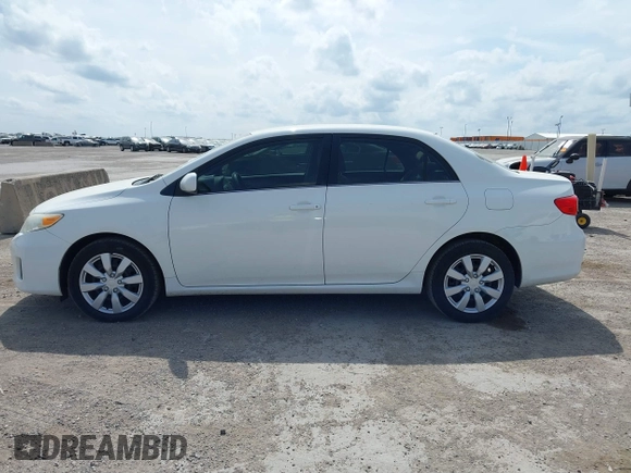 2013 Toyota Corolla L with VIN 5YFBU4EE1DP090957, listed as a IAAI auction lot 41898057 with 127,438 mi miles and . Bid and sale history available at DreamBid. Image 14.