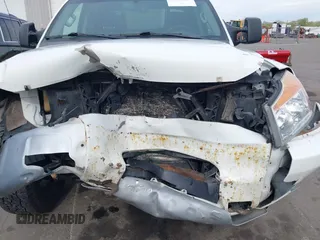 2014 Nissan Titan Pro-4X with VIN 1N6BA0ECXEN501915, listed as a IAAI auction lot 42097967 with 120,851 mi miles and . Bid and sale history available at DreamBid. Image 6.