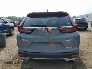 2020 Honda CR-V Touring z VIN 2HKRW2H9XLH236764, wystawiony jako Copart lot #59693475 z przebiegiem Nie podano mil oraz Czysty tytuł • Clean title. Historia ofert i sprzedaży dostępna na DreamBid. Obrazek 6.