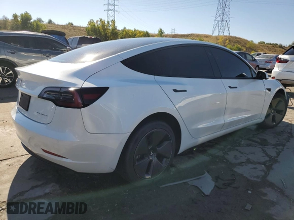 2022 Tesla Model 3 Long Range z VIN 5YJ3E1EB8NF315619, wystawiony jako Copart lot #73309884 z przebiegiem 34 811 mil mil oraz Szkoda całkowita • Salvage title. Historia ofert i sprzedaży dostępna na DreamBid. Obrazek 3.
