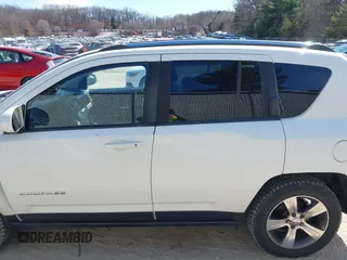 2016 Jeep Compass High Altitude with VIN 1C4NJDEB4GD767731, listed as a IAAI auction lot 41977400 with 99,890 mi miles and . Bid and sale history available at DreamBid. Image 14.