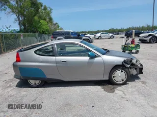 2004 Honda Insight z VIN JHMZE14744T000527, wystawiony jako IAAI lot #42378630 z przebiegiem 1 360 mil mil oraz . Historia ofert i sprzedaży dostępna na DreamBid. Obrazek 13.