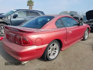 1996 Ford Mustang GT с VIN 1FALP42X2TF163881, выставлен на аукционе IAAI как лот 42342549 с пробегом 92 660 миль миль и . История ставок и продаж доступна на DreamBid. Изображение 4.