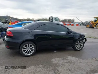 2014 Volkswagen Eos Komfort with VIN WVWBW8AH4EV007229, listed as a IAAI auction lot 41894160 with 66,984 mi miles and . Bid and sale history available at DreamBid. Image 13.